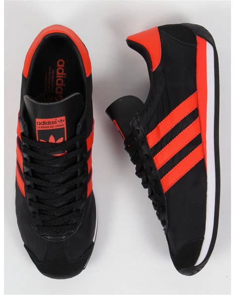 adidas sneakers oranje|adidas black and orange shoes.